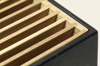 detail of shower tray with wood footboard