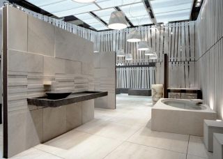 Lavabo sospeso con piletta di scarico a scomparsa e catino sovrapposto Lavabo sospeso con piletta di scarico a scomparsa e catino sovrapposto